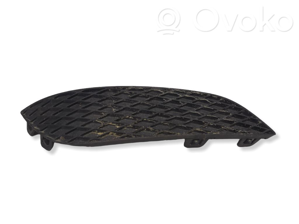 Opel Astra H Moldura/rejilla de la luz antiniebla delantera 