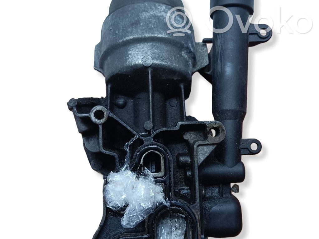 Opel Corsa D Oil filter mounting bracket 