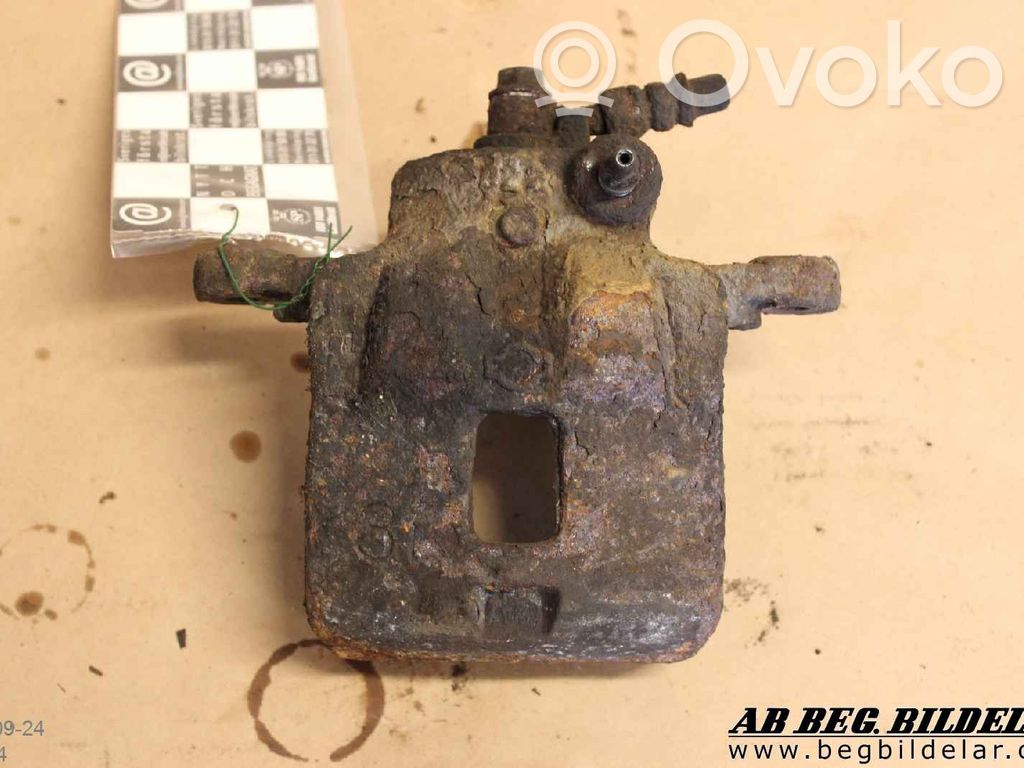 Nissan Almera Caliper de freno delantero 