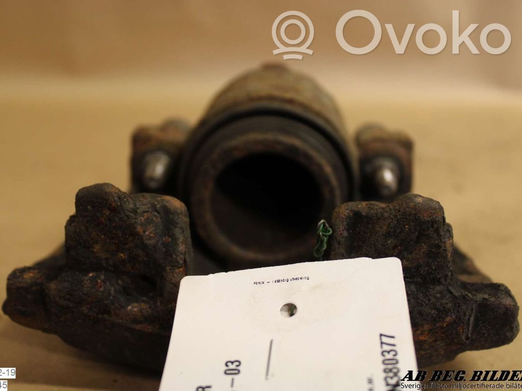 Opel Astra G Caliper de freno delantero 