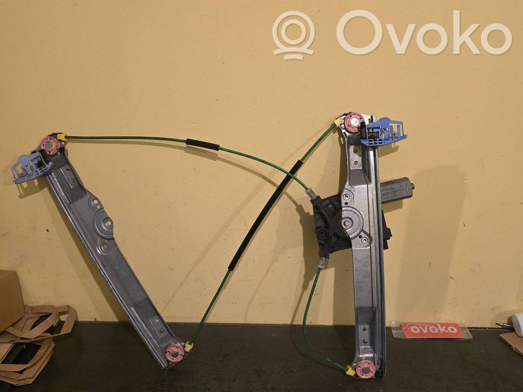 Opel Corsa D Elektryczny podnośnik szyby drzwi przednich 