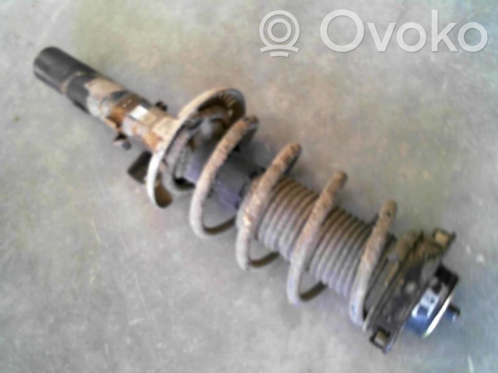 Volkswagen Polo IV 9N3 Amortyzator osi przedniej ze sprężyną 