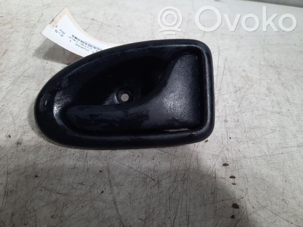 Manecilla interna puerta delantera