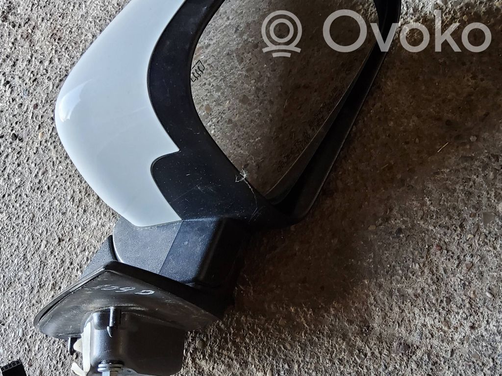 Front door electric wing mirror