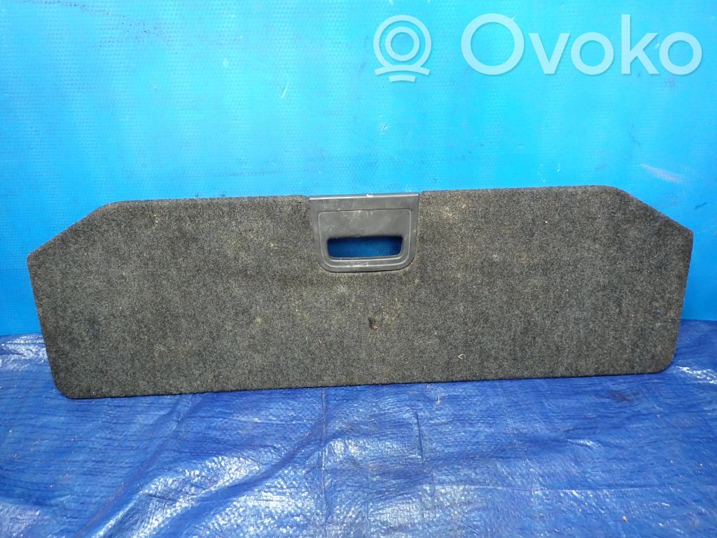 Trunk bottom trim panel