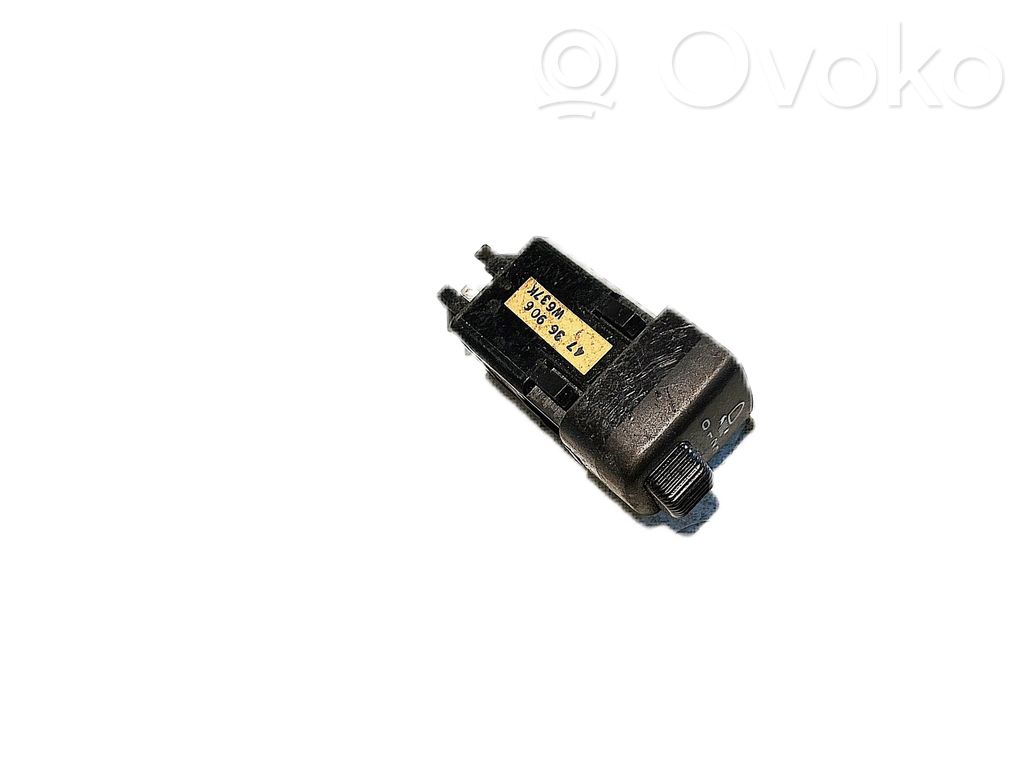 Headlight level height control switch   4736906