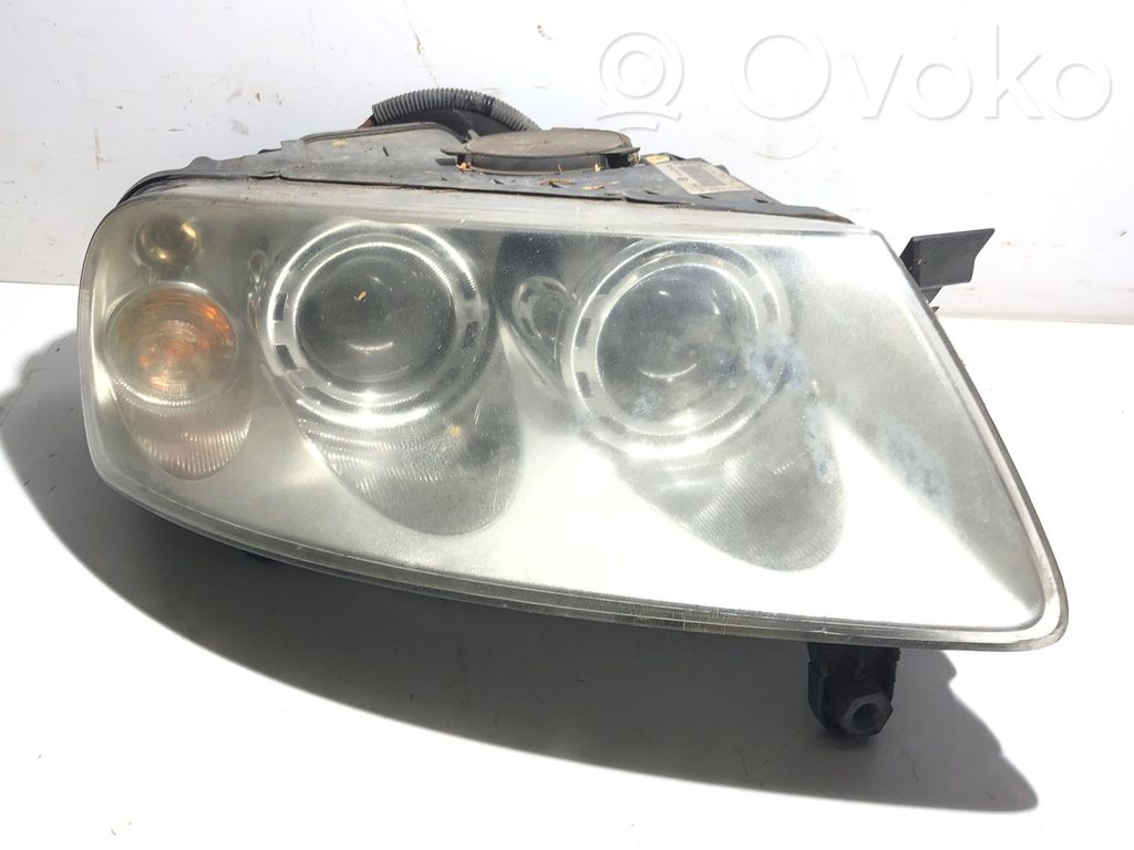 Volkswagen Touareg I Lampa przednia 