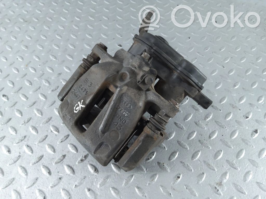 Audi A8 S8 D4 4H Tylny zacisk hamulcowy 