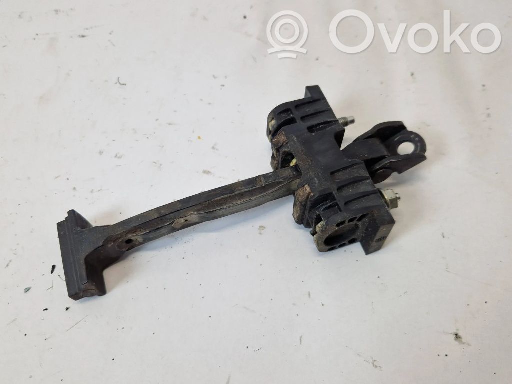 Saab 9-5 Front door check strap stopper 