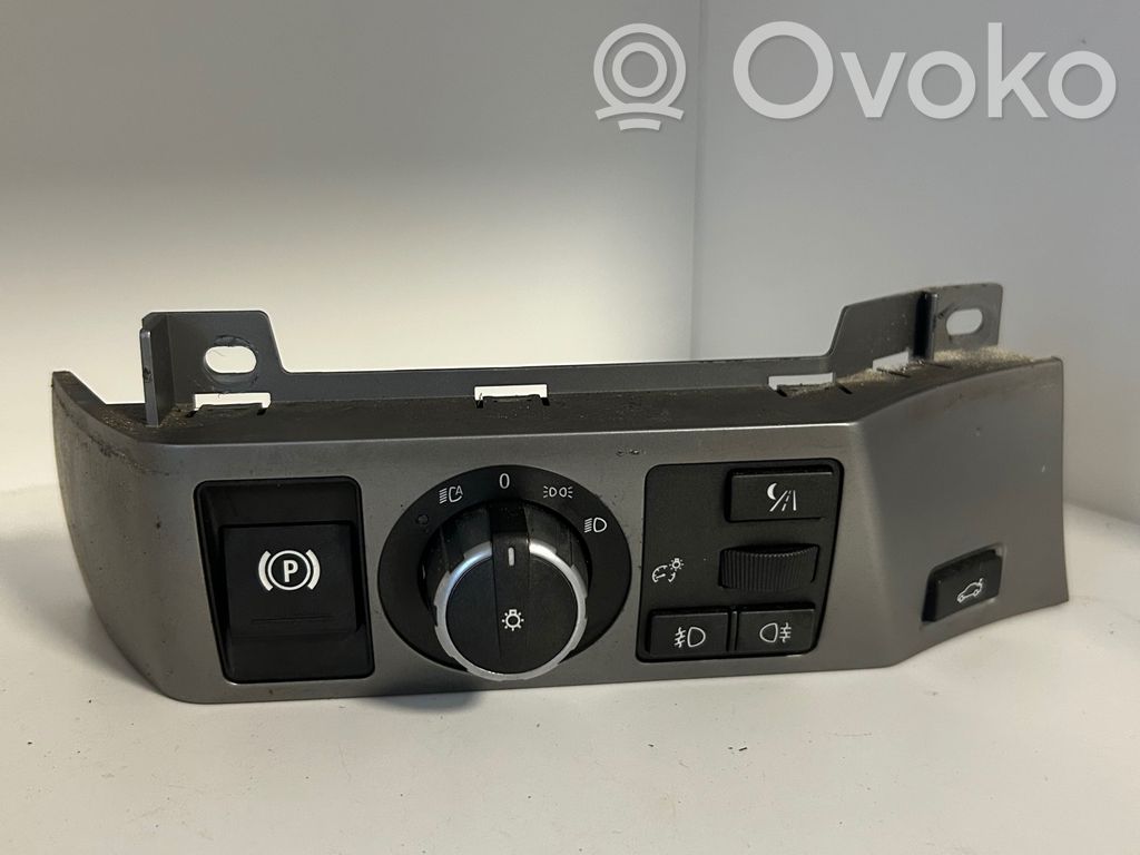 Headlight level height control switch   6949933