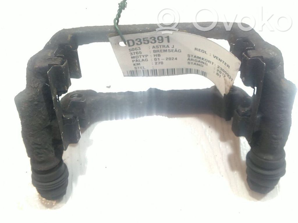 Opel Astra J Mocowanie przedniego zacisku hamulca 