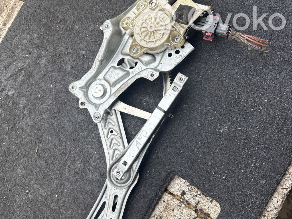 Opel Vectra C Elektryczny podnośnik szyby drzwi przednich 