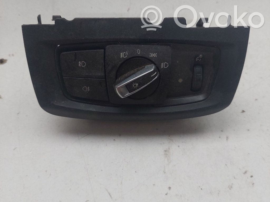 Headlight level height control switch   931172704