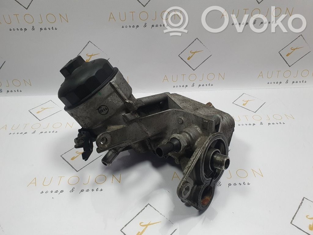 Opel Zafira B Oil filter mounting bracket 