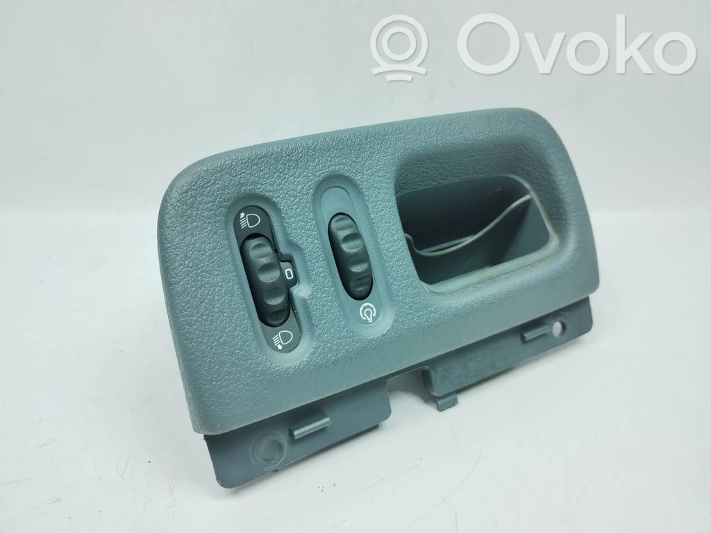 Headlight level height control switch   7700416950