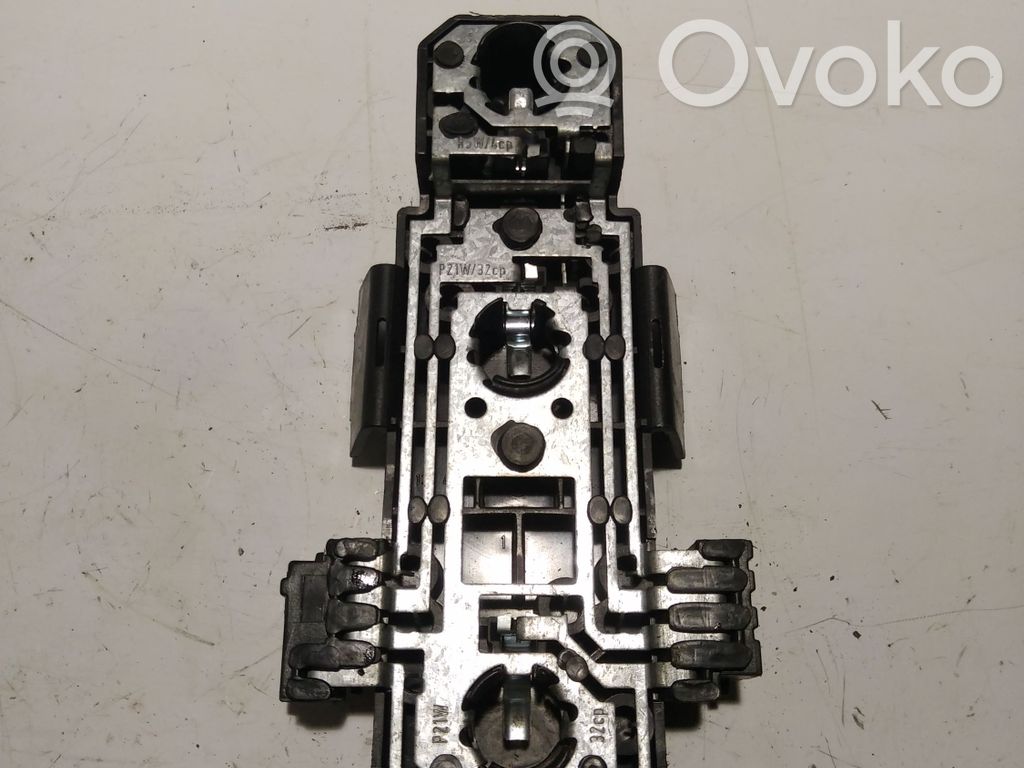 Volvo 960 Aizmugures spuldzes vāka turētājs 