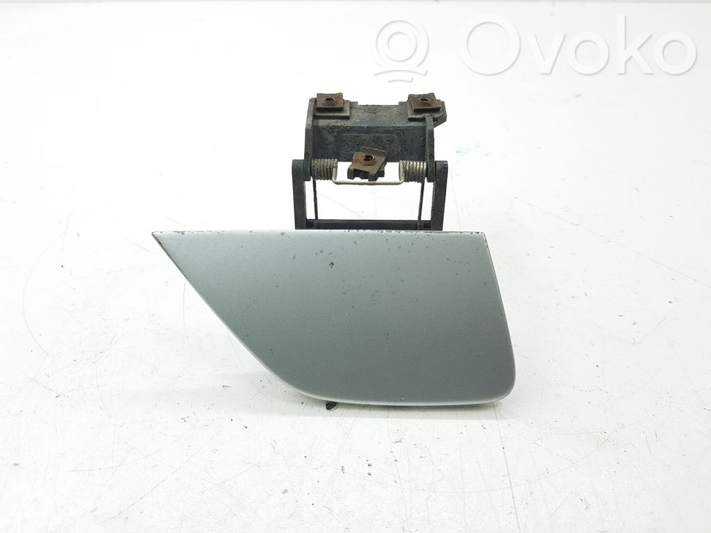 Zaślepka spryskiwacza lampy przedniej   7015024