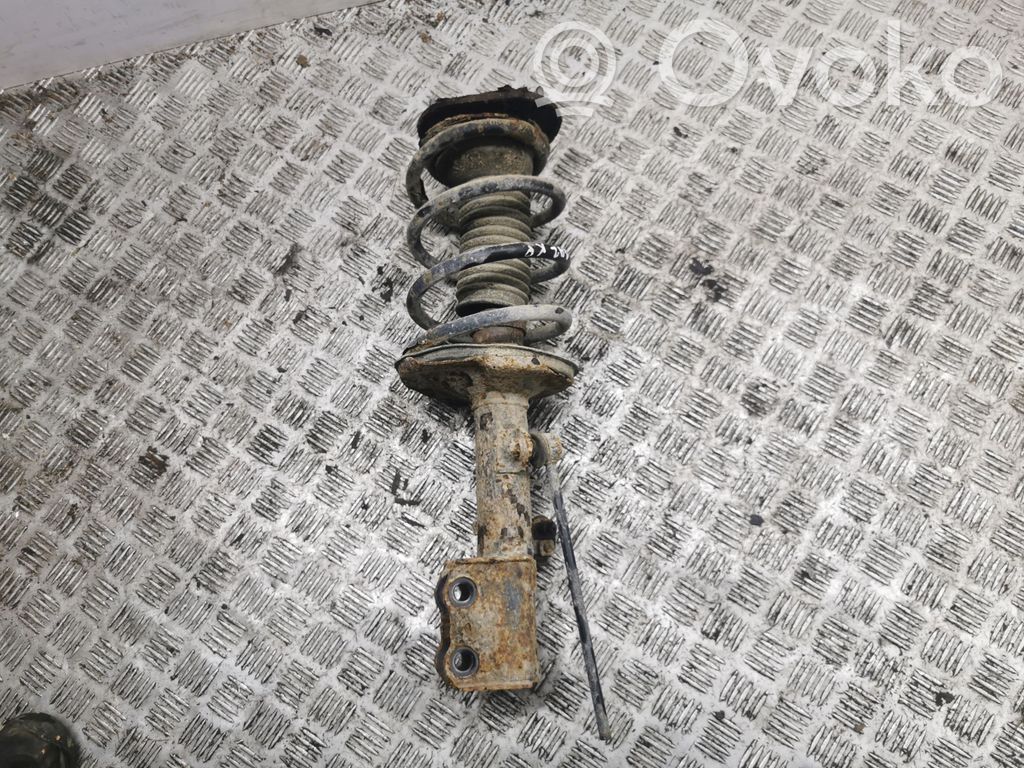Front shock absorber with coil spring