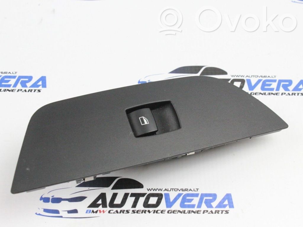 Electric window control switch   6935534