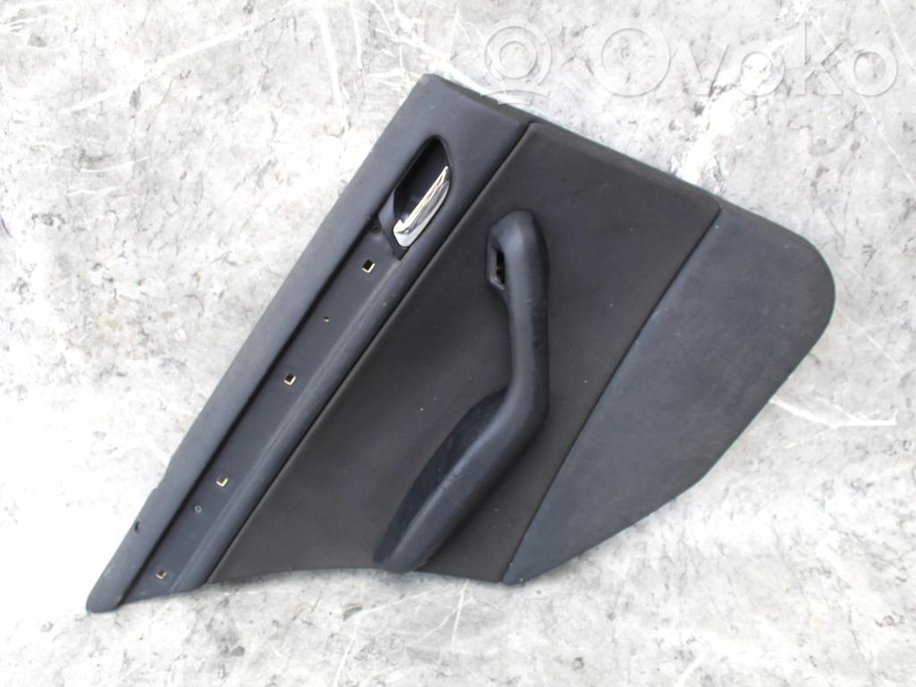 Coupe rear side trim panel