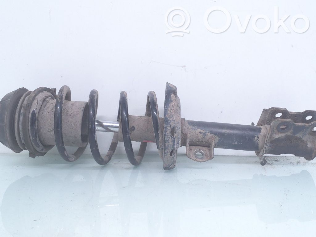 Front shock absorber with coil spring