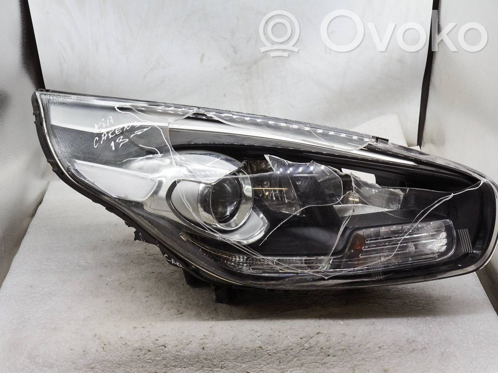 KIA Carens III Lampa przednia 