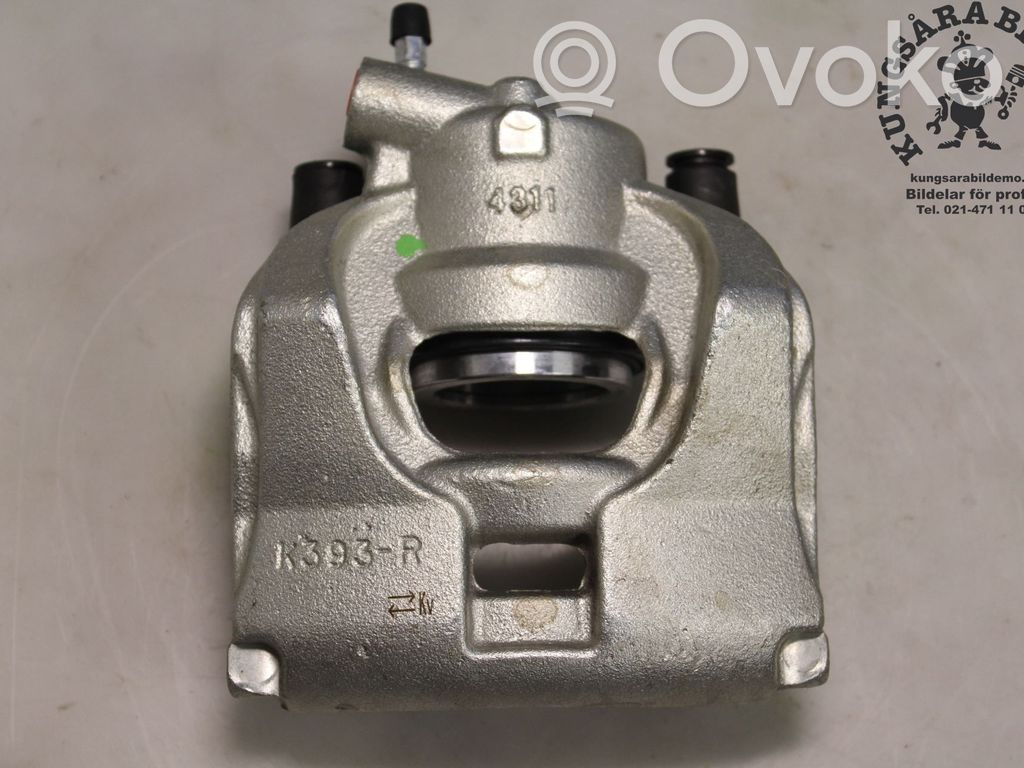 Ford Mondeo MK IV Zacisk hamulcowy przedni 
