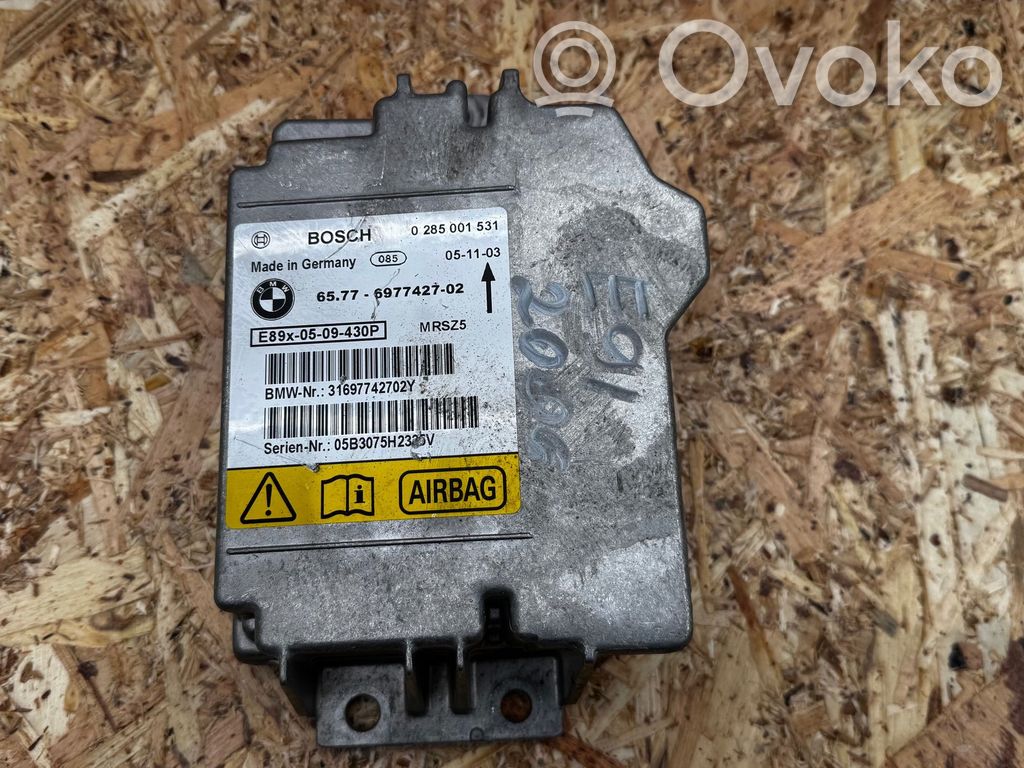 Module de contrôle airbag   6977427,31697742702Y,0285001531