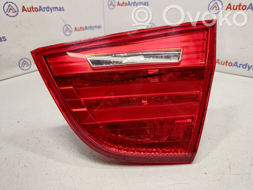 BMW 3 E90 E91 Aizmugurējais lukturis pārsegā 