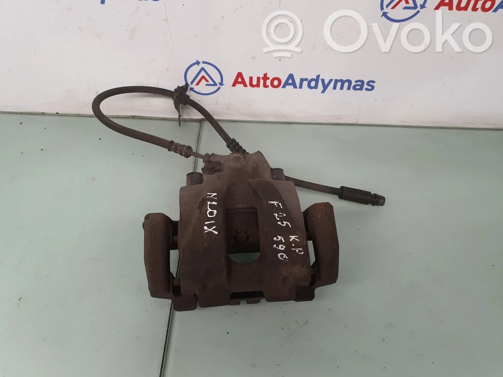 BMW X3 F25 Zacisk hamulcowy przedni 