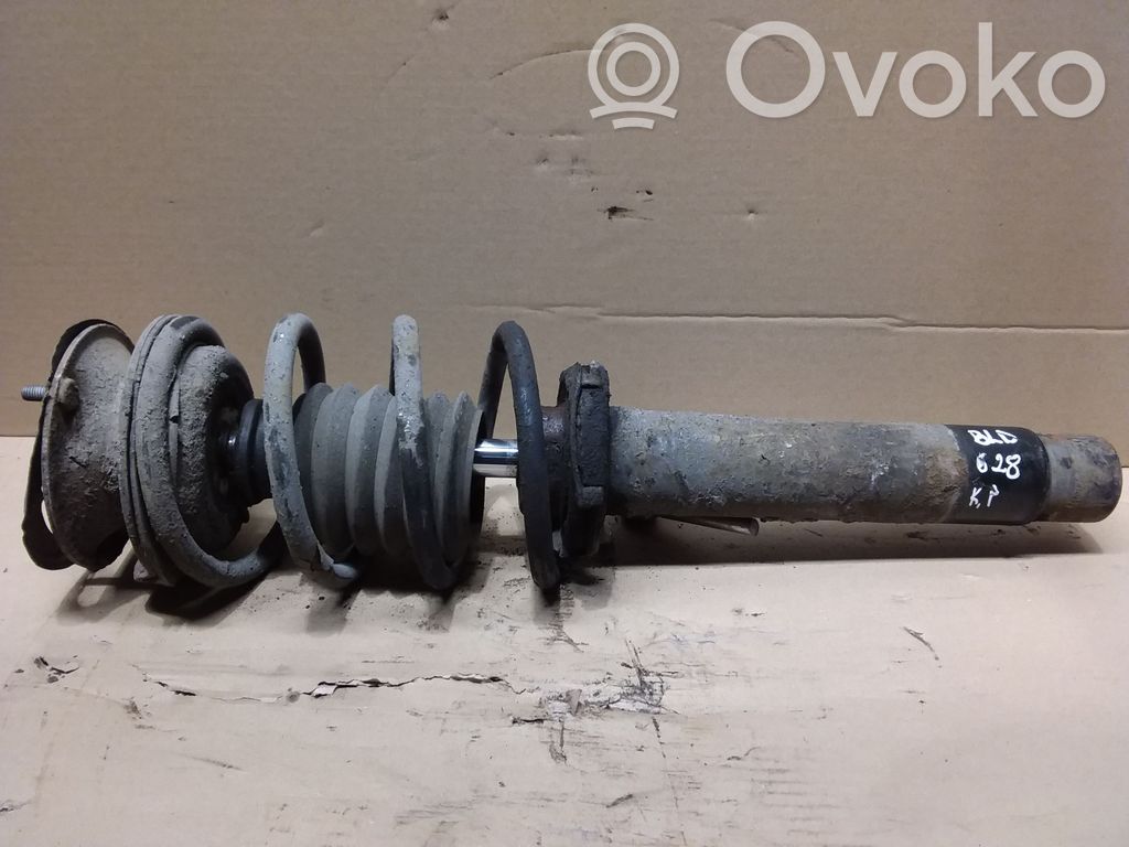 Front shock absorber with coil spring