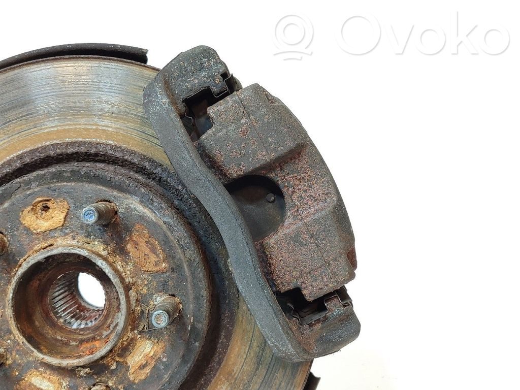Opel Astra J Zacisk hamulcowy przedni 