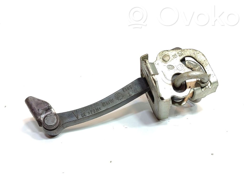 Front door check strap stopper   3453230
