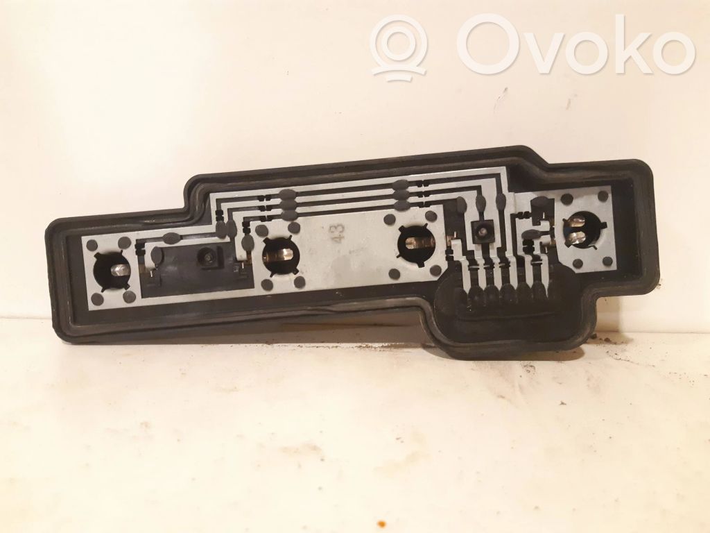 Volkswagen Caddy Takavalon polttimon suojan pidike 