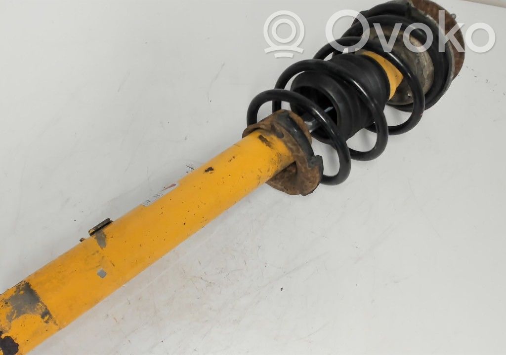 Front shock absorber with coil spring   87411484LSPOR