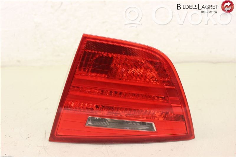 BMW 3 E90 E91 Aizmugurējais lukturis pārsegā 