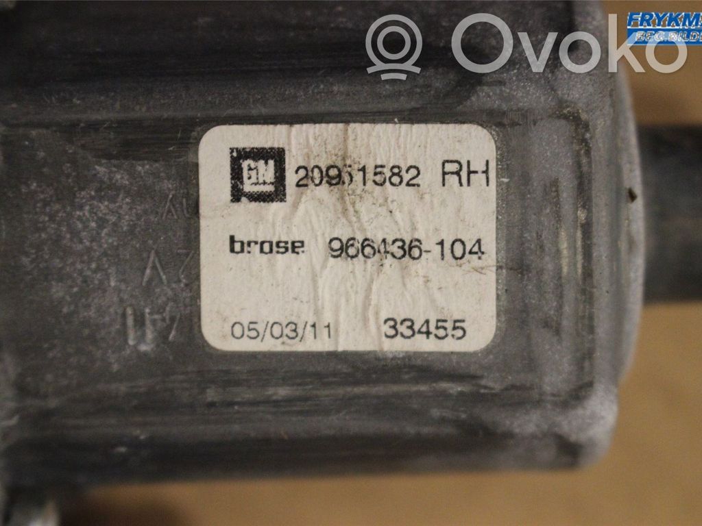 Opel Astra J Elektryczny podnośnik szyby drzwi przednich 