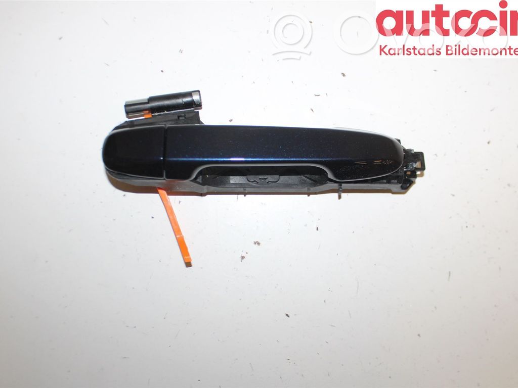 Manecilla externa puerta delantera