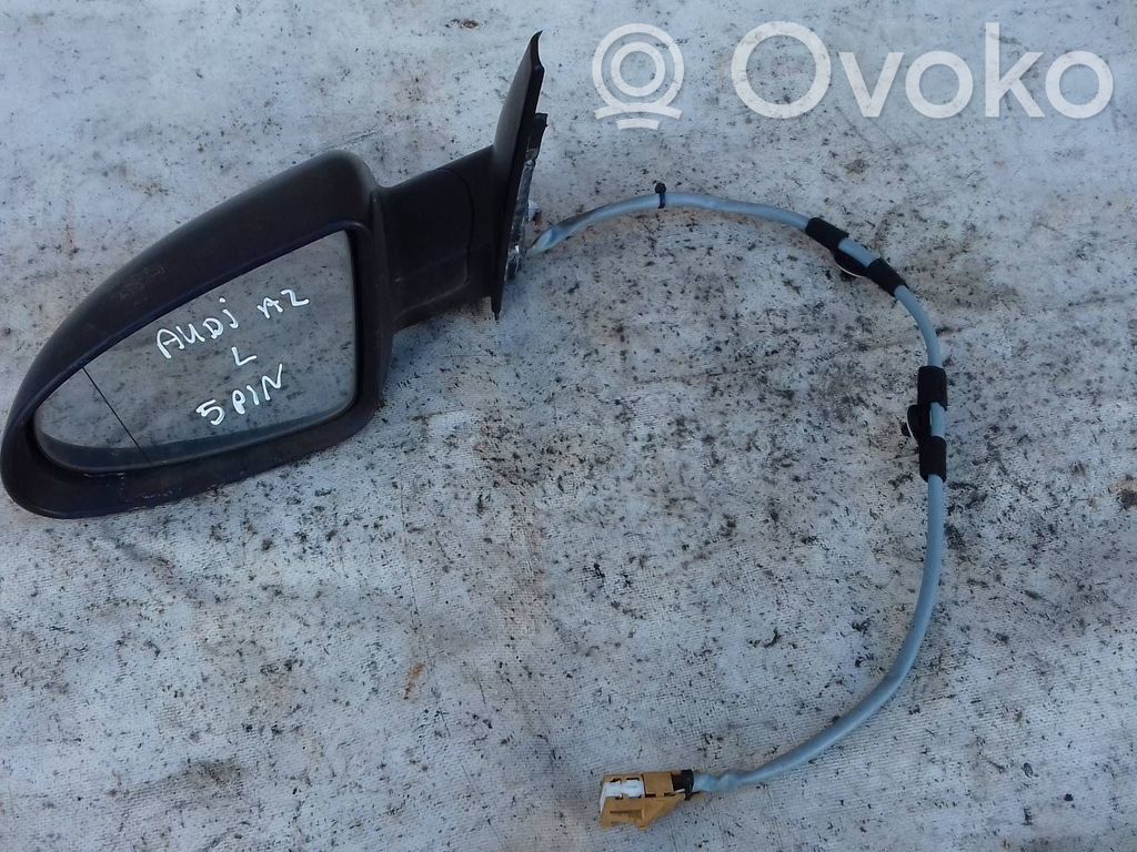 Front door electric wing mirror