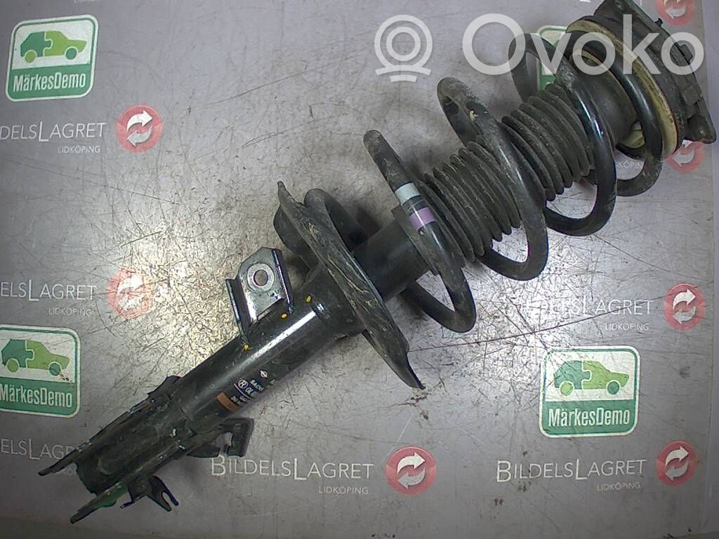 Nissan Qashqai+2 Amortyzator osi przedniej ze sprężyną 