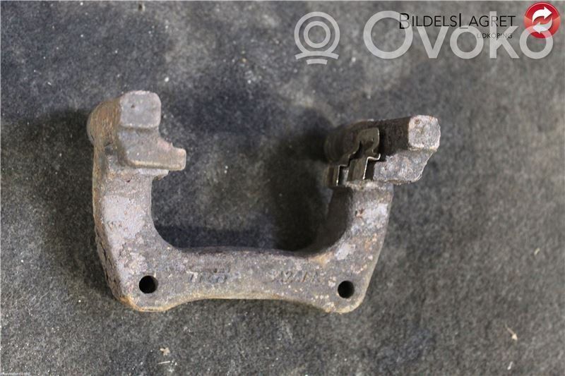 Peugeot Partner Mocowanie / Zacisk hamulca tylnego 