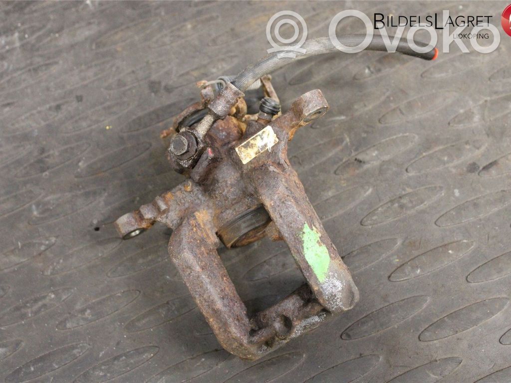Opel Astra J Tylny zacisk hamulcowy 