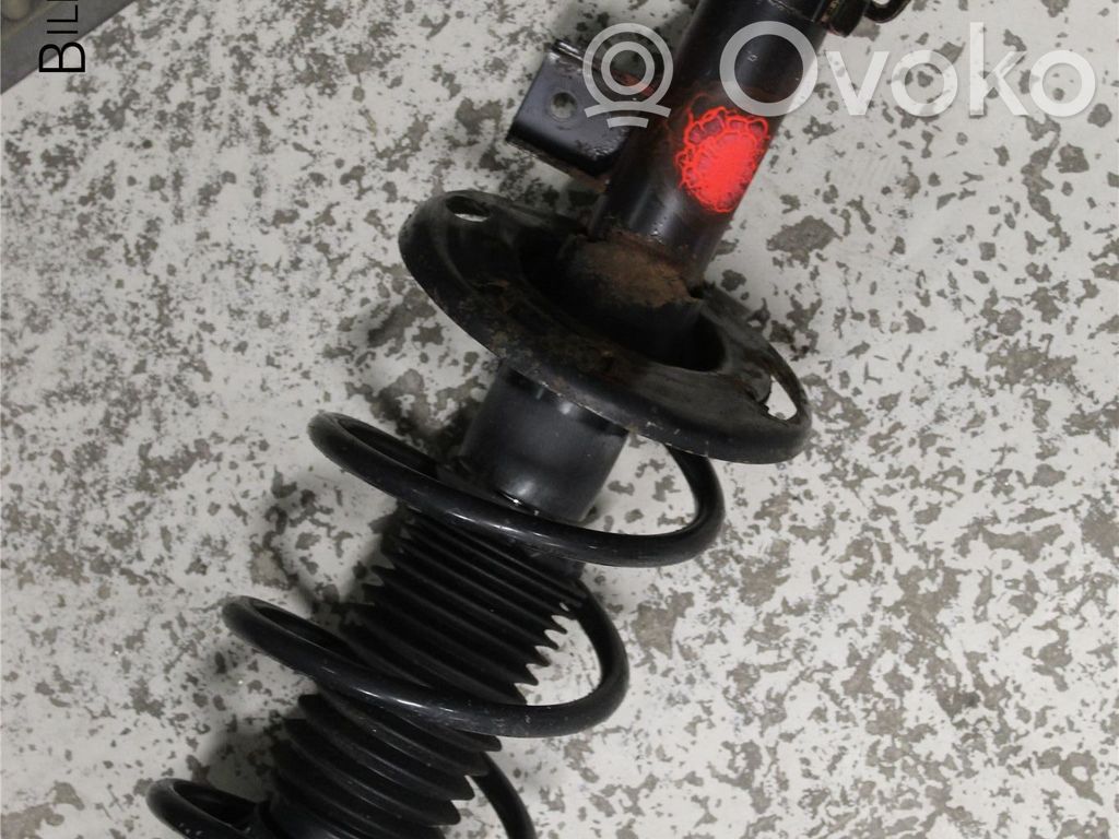 Mazda 3 III Front shock absorber with coil spring 