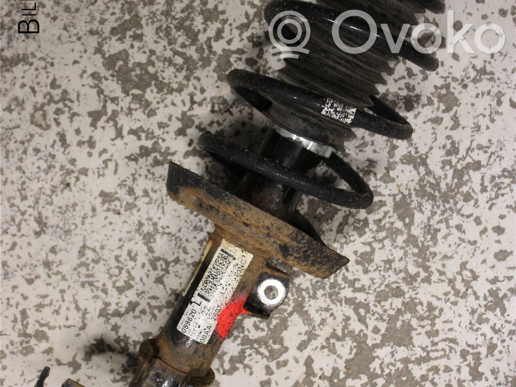 Opel Astra J Etuiskunvaimennin kierrejousella 