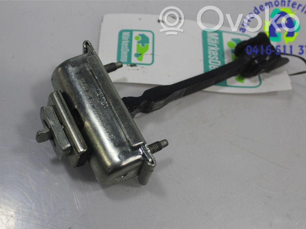 Front door check strap stopper   2007334