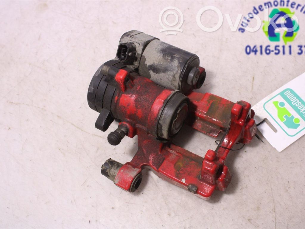Ford Mondeo MK V Tylny zacisk hamulcowy 
