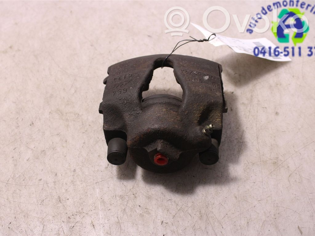 Opel Astra G Zacisk hamulcowy przedni 