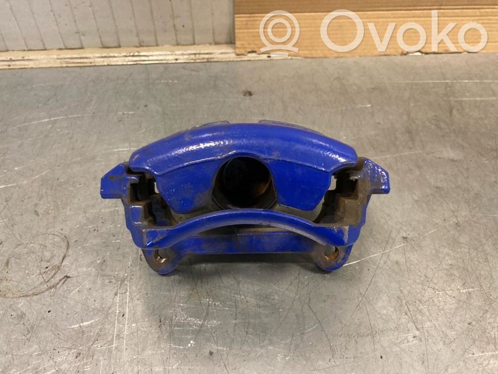 Volkswagen Golf VII Zacisk hamulcowy przedni 