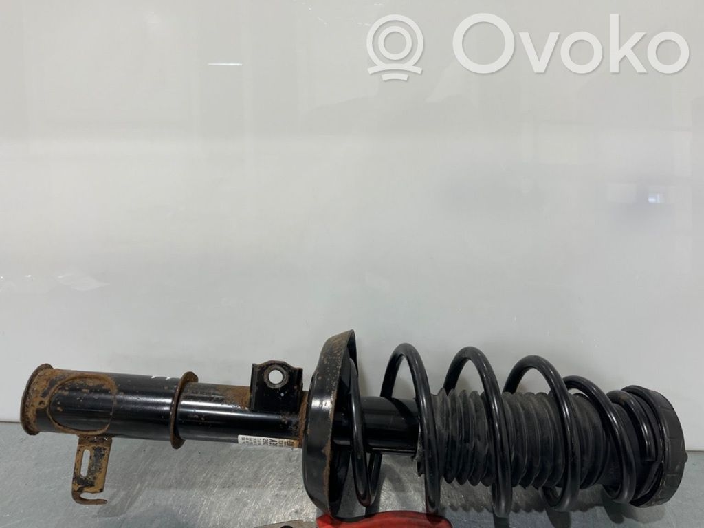 Opel Astra J Amortyzator osi przedniej ze sprężyną 
