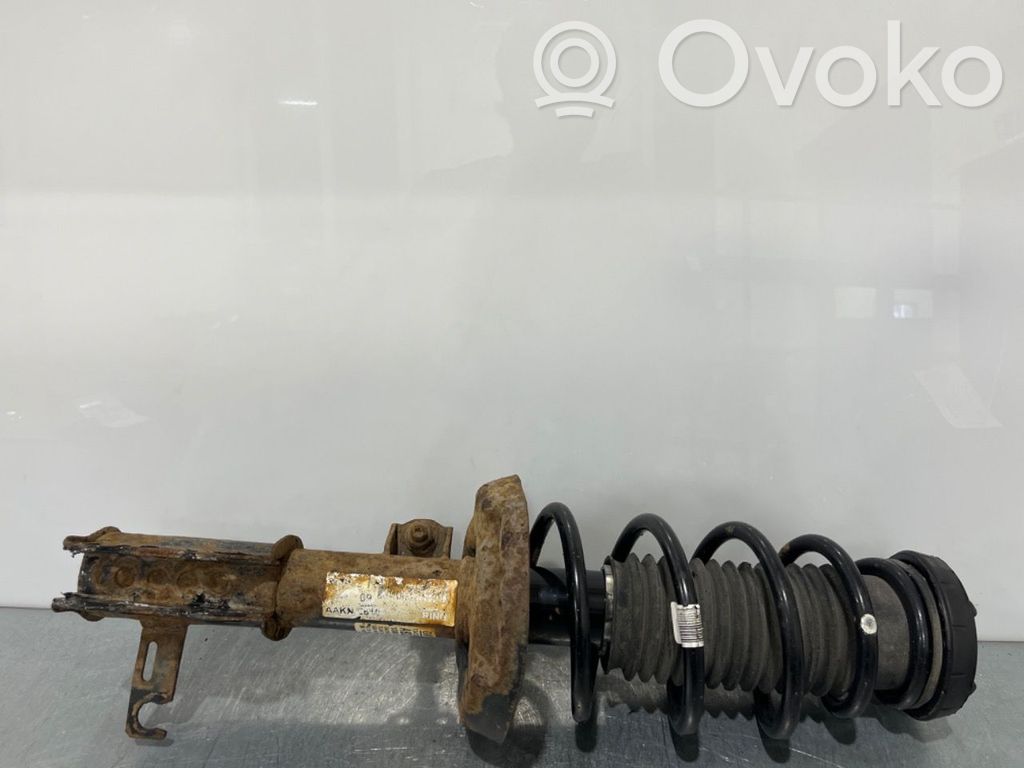 Opel Astra J Amortyzator osi przedniej ze sprężyną 